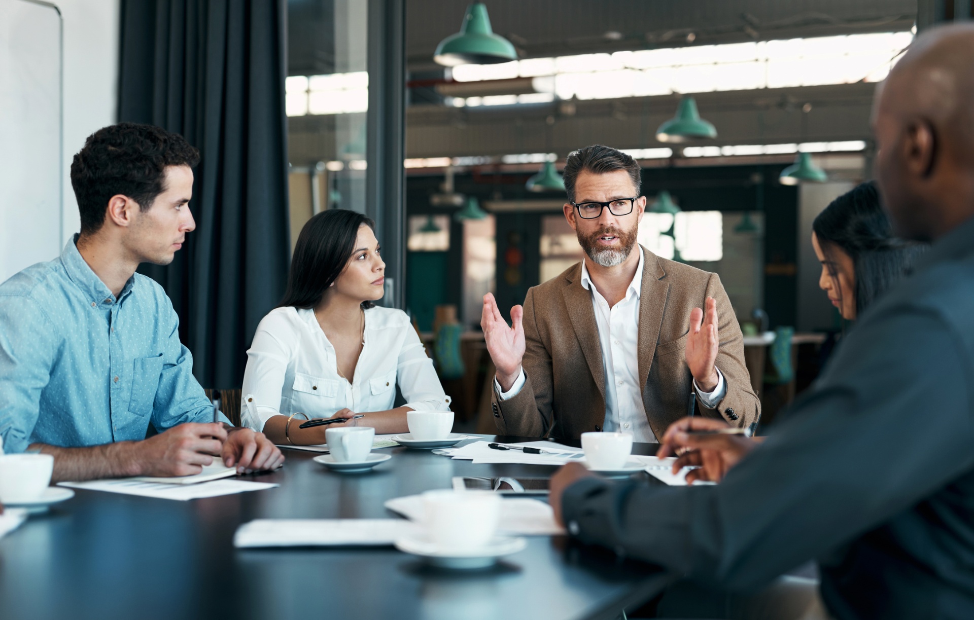 Chase consultants collaborating with a client leadership team